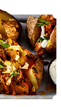 Warming chicken tikka jackets, fluffy and golden baking potatoes £1.78 2kg, tikka masala cooking sauce 93p 500g